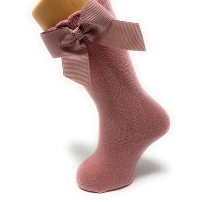 Powder pink knee-high socks with bow